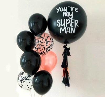 Фонтан из черных воздушных шаров и шар-гигант «Для мужчин»